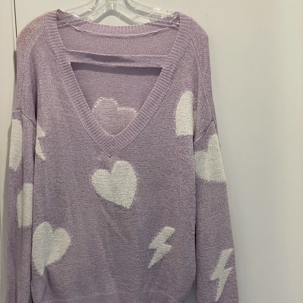 Mainstrip cute lavender sweater with white hearts.